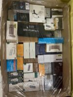 Sealed assorted merchandise boxes for sale by the pallet